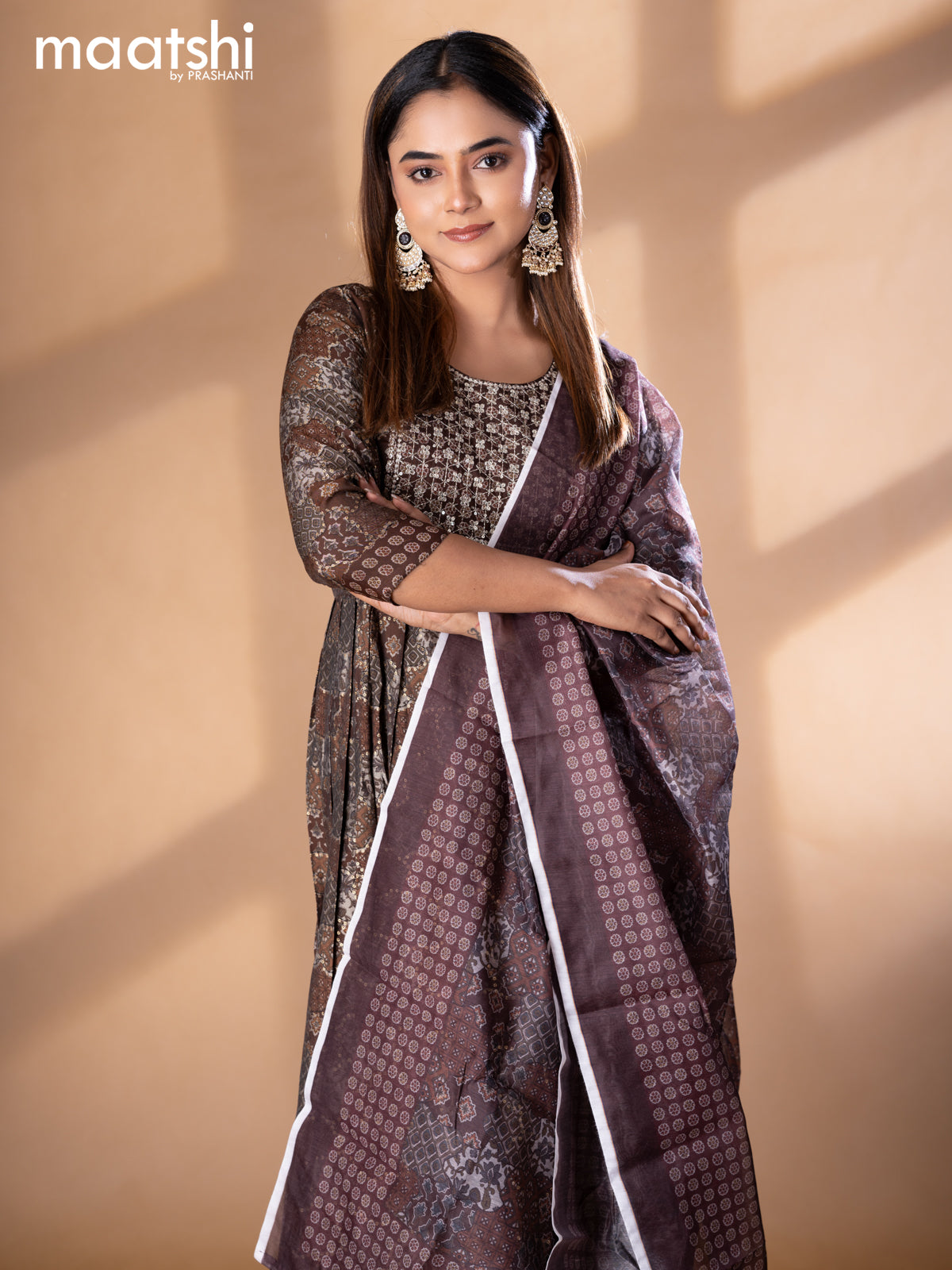 Modal readymade naira cut salwar suits brown with allover prints & sequin work neck pattern and straight cut pant & printed dupatta