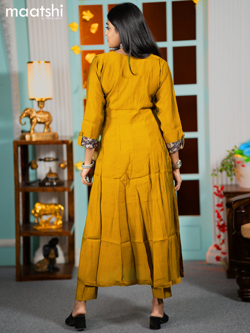 Muslin readymade umbrella kurti mustard yellow with embroidery work neck pattern and straight cut pant