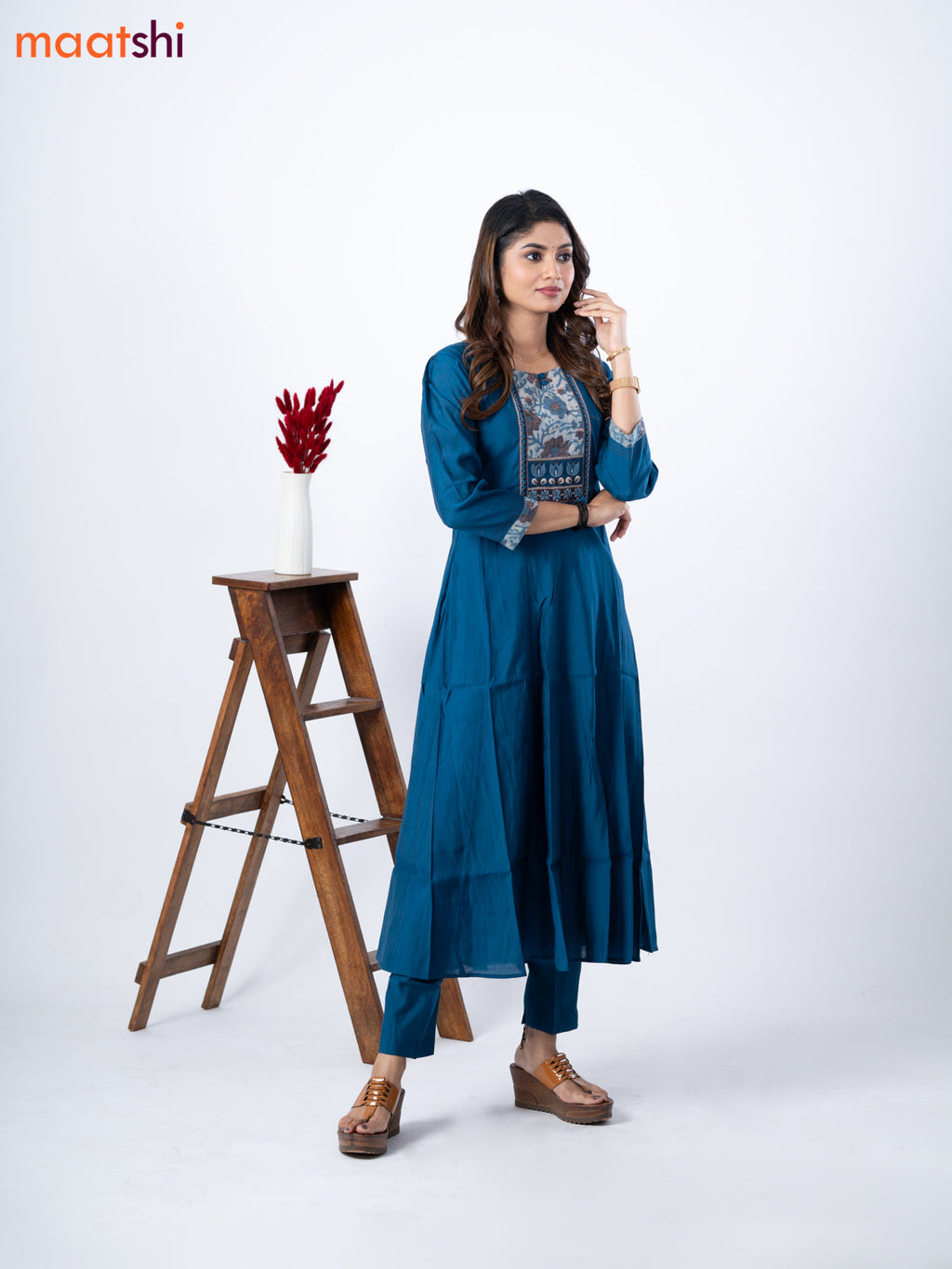 Muslin umbrella kurti peacock blue with embroidery work neck pattern and straight cut pant