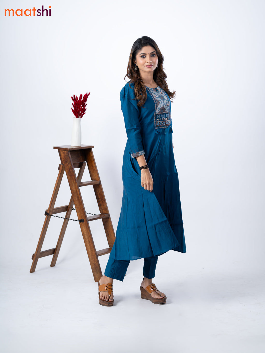 Muslin umbrella kurti peacock blue with embroidery work neck pattern and straight cut pant