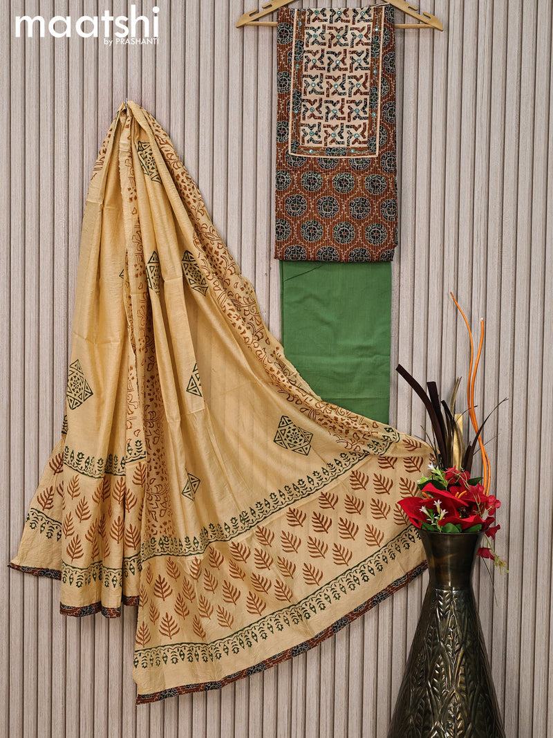 Cotton dress material dark mustard and sandal with allover thread weaves & butta prints and bottom & tussar dupatta