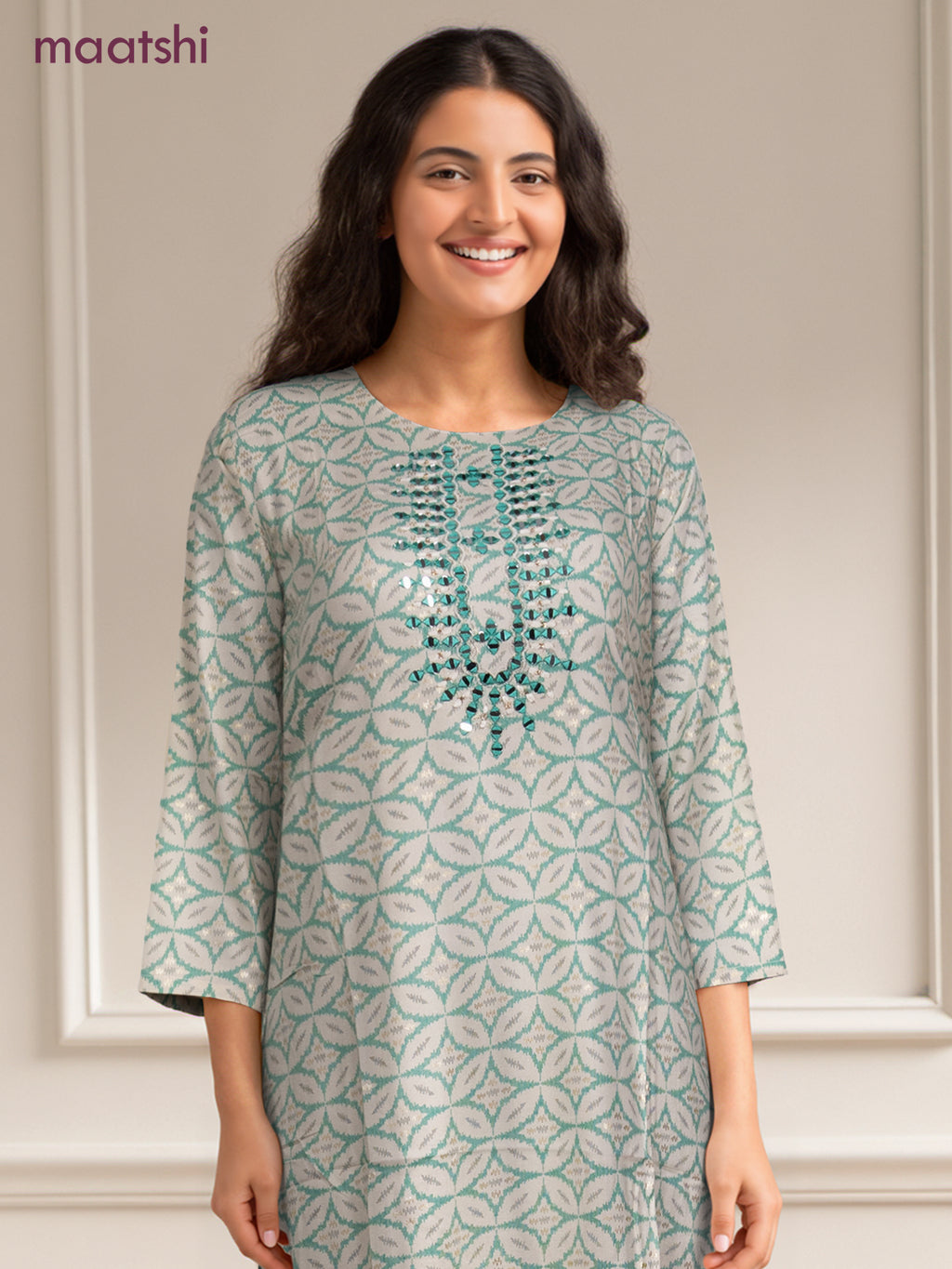 Cotton readymade kurti off white and teal green with allover geometric prints & simple work neck pattern without pant