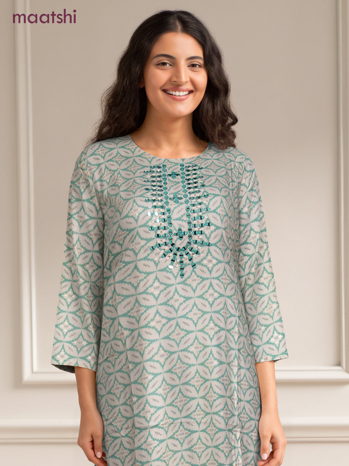 Cotton readymade kurti off white and teal green with allover geometric prints & simple work neck pattern without pant