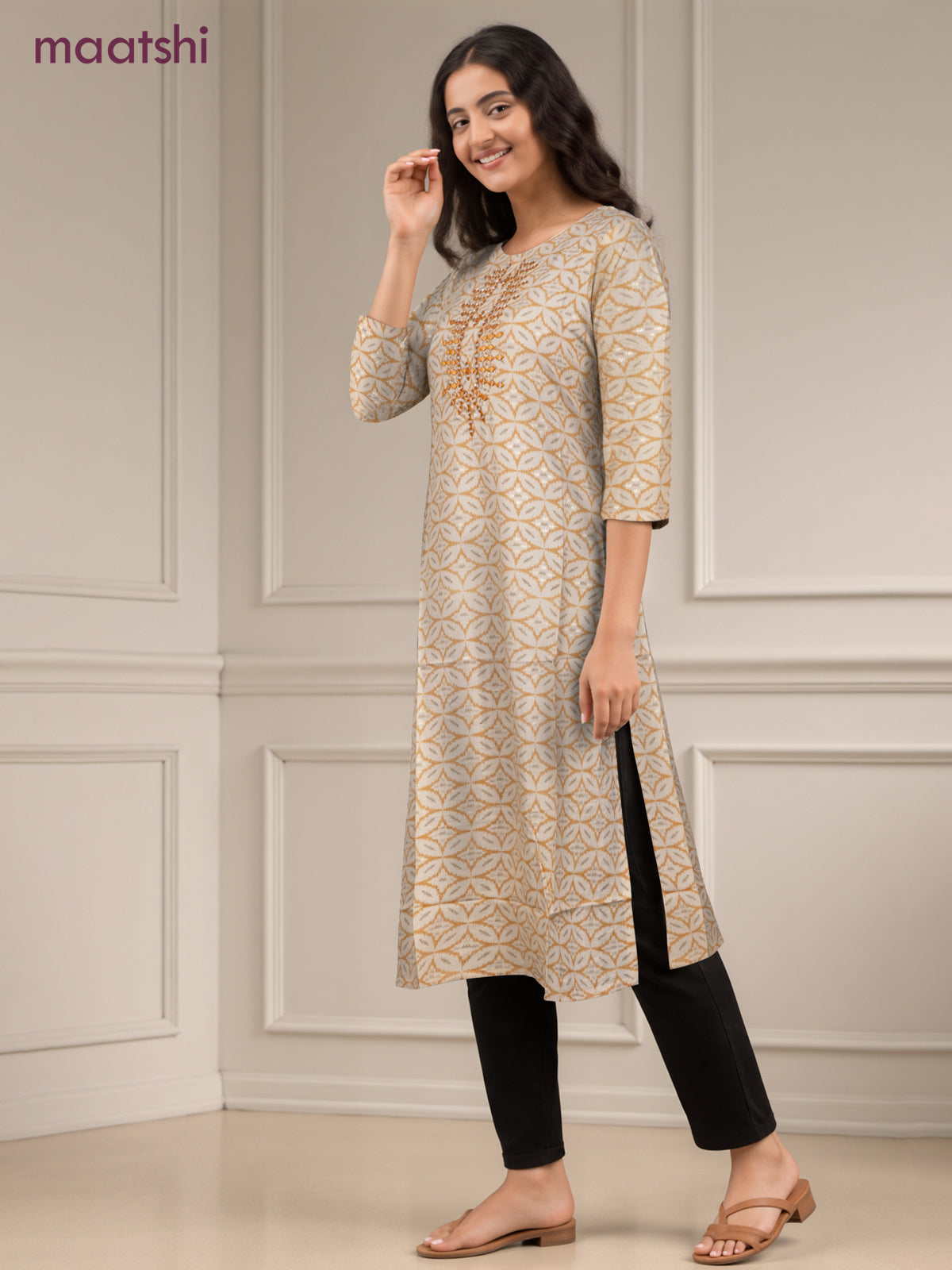 Cotton readymade kurti off white and mustard yellow with allover geometric prints & simple work neck pattern without pant