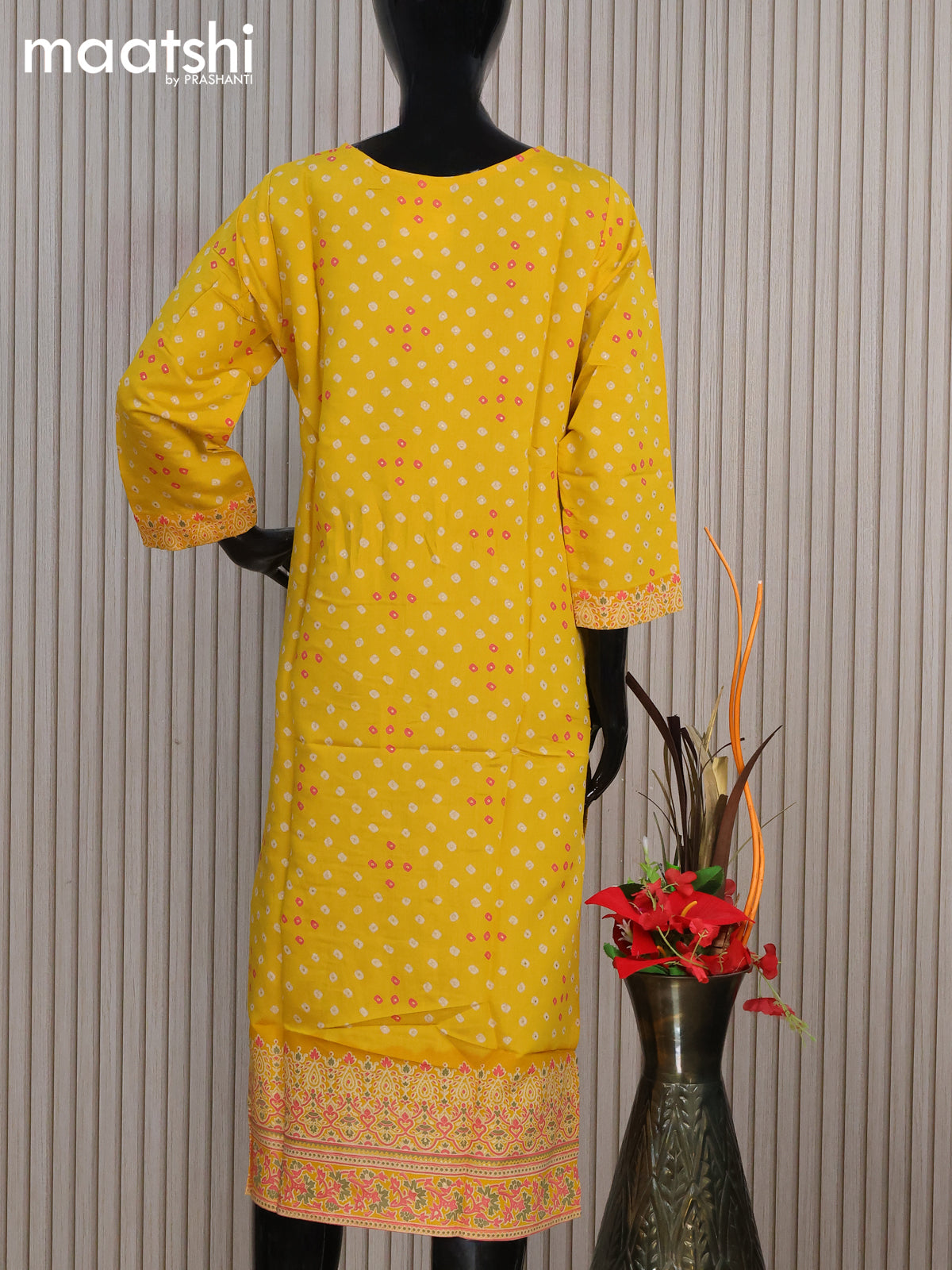 Modal readymade kurti yellow with allover bandhani prints & simple work neck pattern without pant