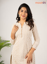 Semi georgette kurti beige with allover chikankari work & simple neck pattern without pant