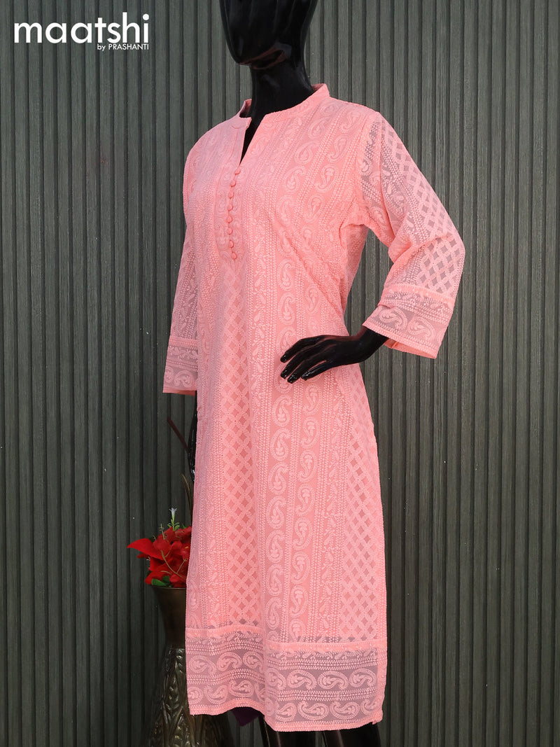 Semi georgette readymade kurti peach pink with allover chikankari work & simple neck pattern without pant