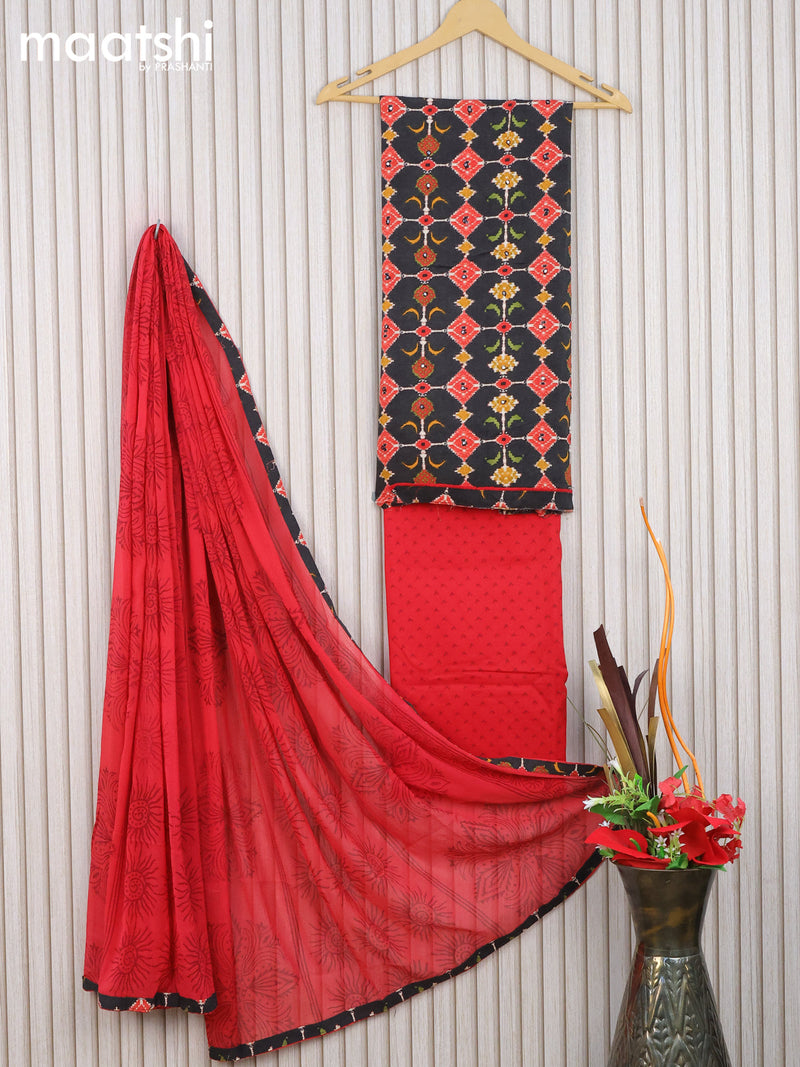 Muslin dress material black and red with allover ikat prints & mirror work and bottom & chiffon dupatta
