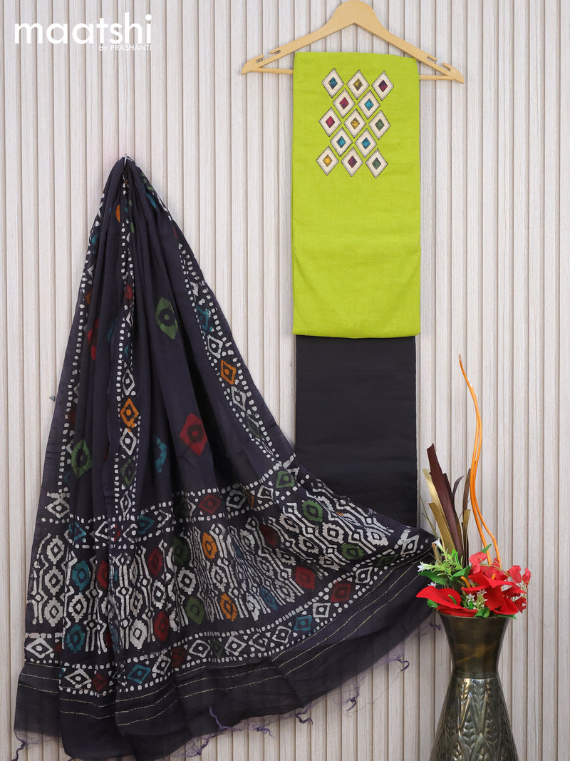 Cotton dress material lime green and black with patch work neck neck design and bottom & batik prints dupatta