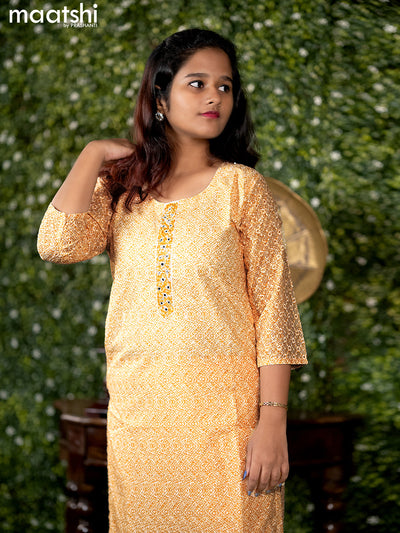 Rayon readymade kurti off white and yellow with geometric print chikankari work & beaded neck pattern without pant