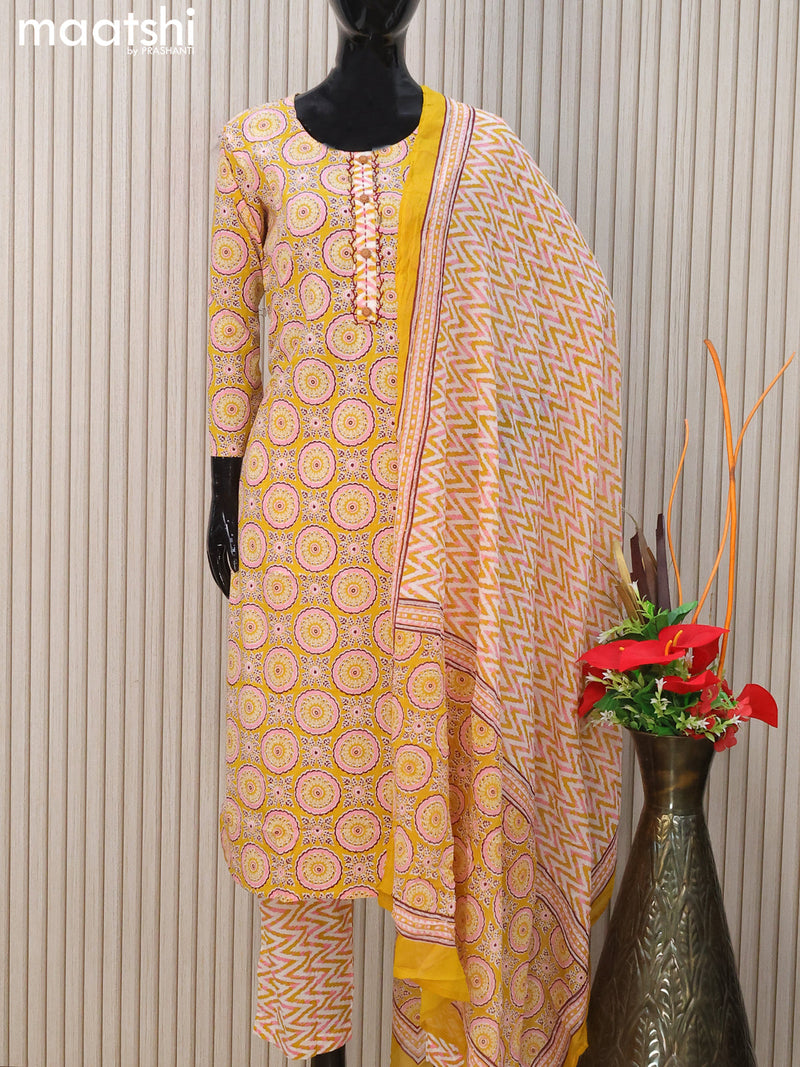 Cotton readymade salwar suits yellow and off white with allover ajrakh prints & simple neck pattern and straight cut pant & cotton dupatta