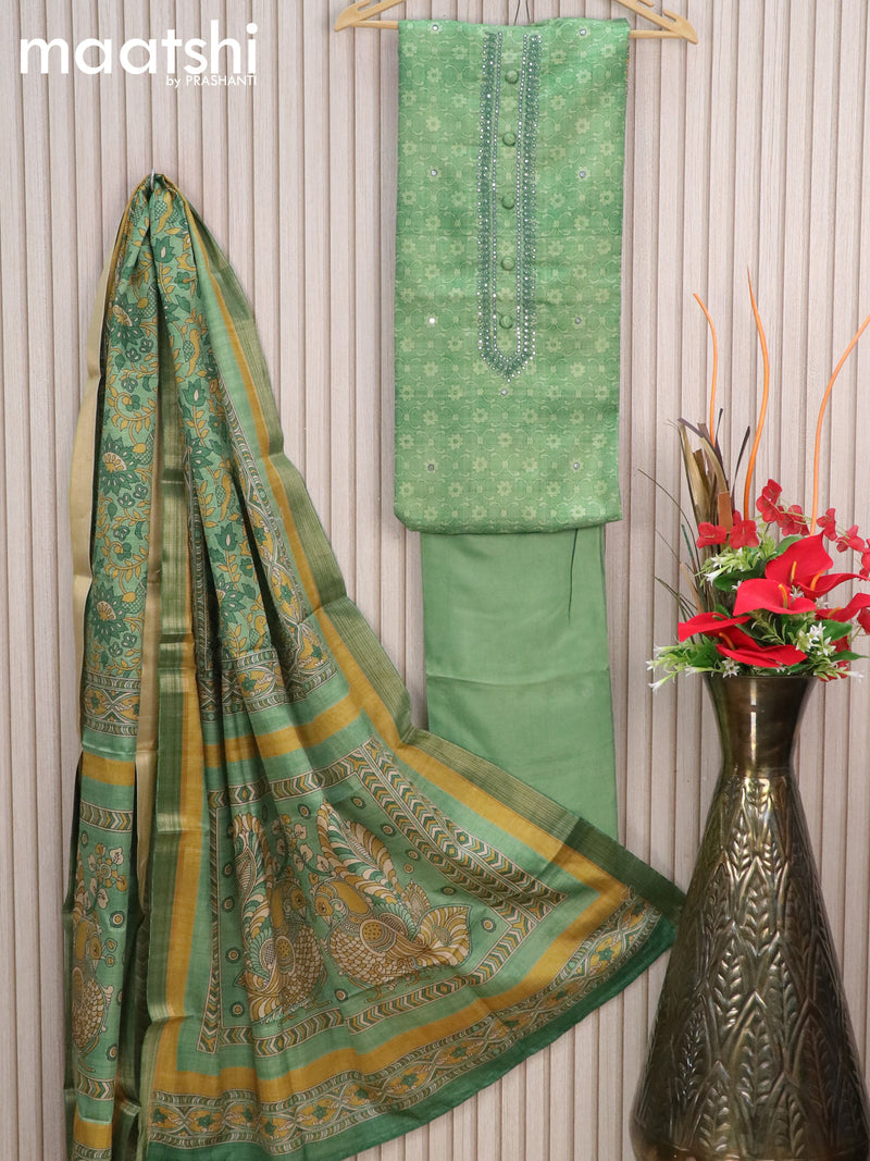 Semi tussar dress material green shade with allover prints & mirror work neck pattern and bottom & kalamkari printed dupatta