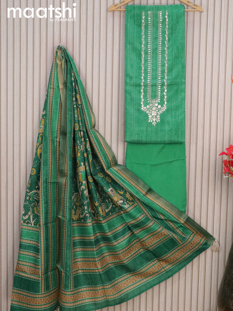 Semi tussar dress material green shade with allover prints & gottapatti work neck pattern and bottom & kalamkari printed dupatta