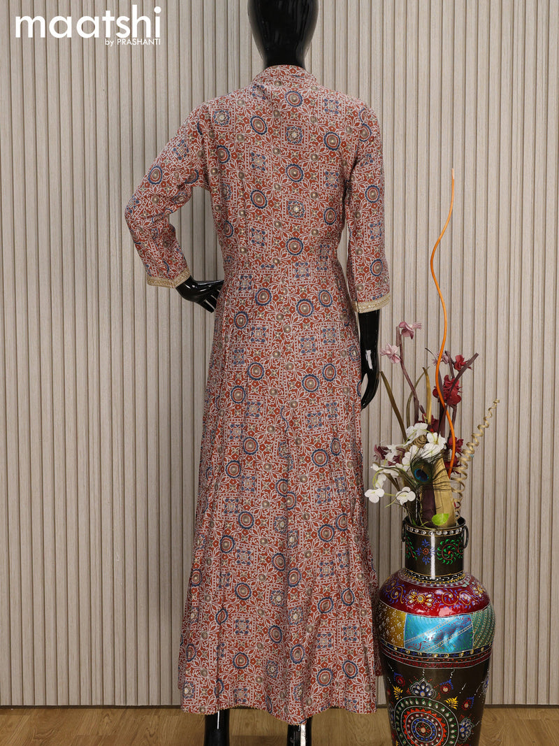 Muslin readymade floor length kurti rust shade with allover prints & simple neck pattern without pant