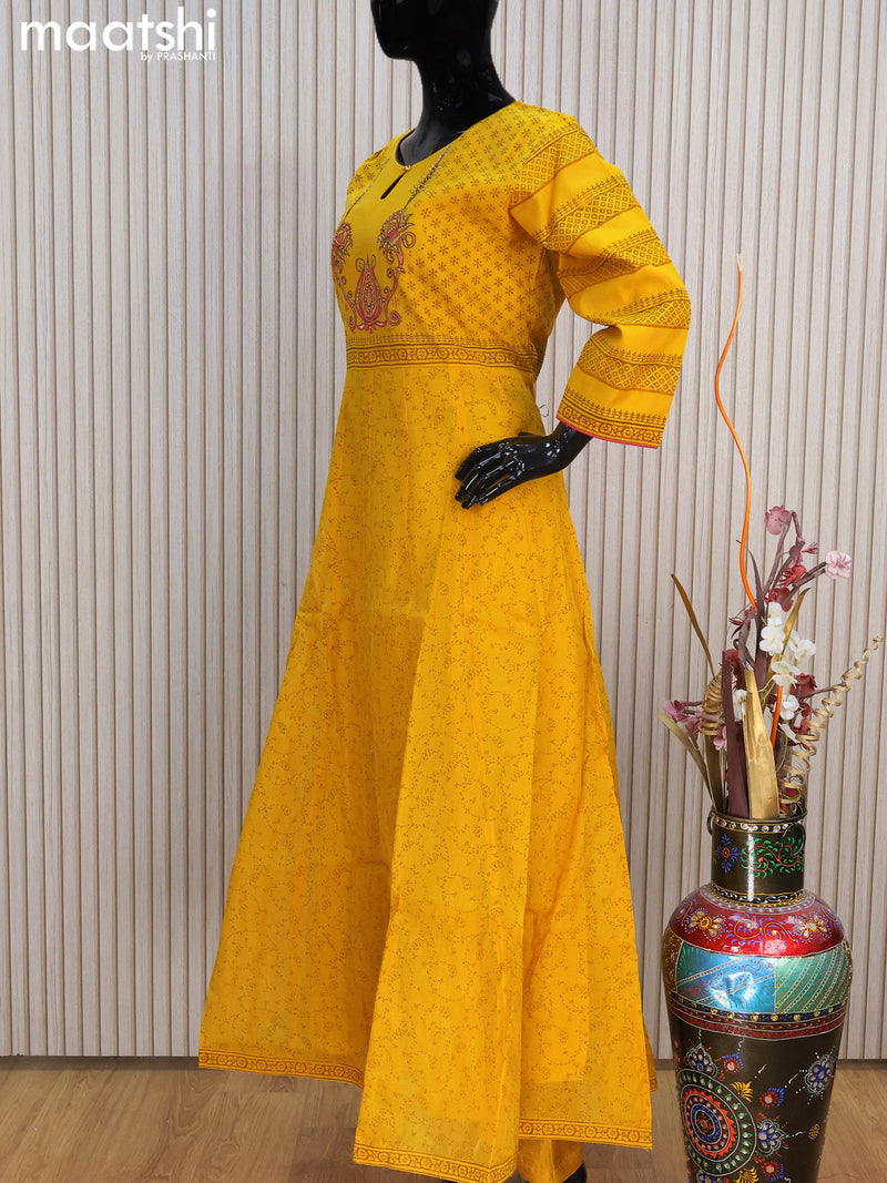 Raw silk readymade anarkali salwar suits yellow with allover prints & embroidery work neck pattern and straight cut pant & dupatta