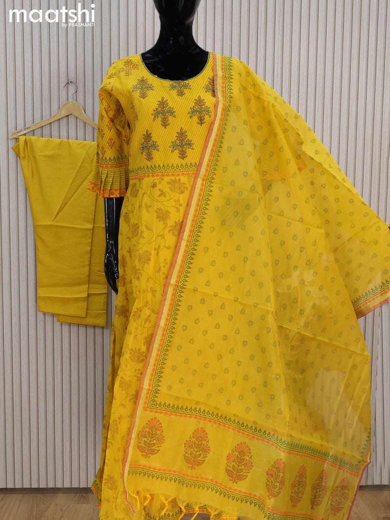 Raw silk readymade anarkali salwar suits yellow with allover prints & embroidery work neck pattern and straight cut pant & dupatta