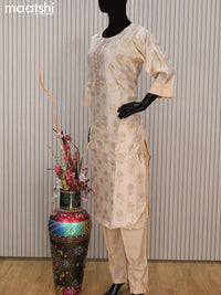 Chanderi readymade salwar suit beige and rustic orange with allover butta prints & embroidery work neck pattern and straight cut pant & printed dupatta