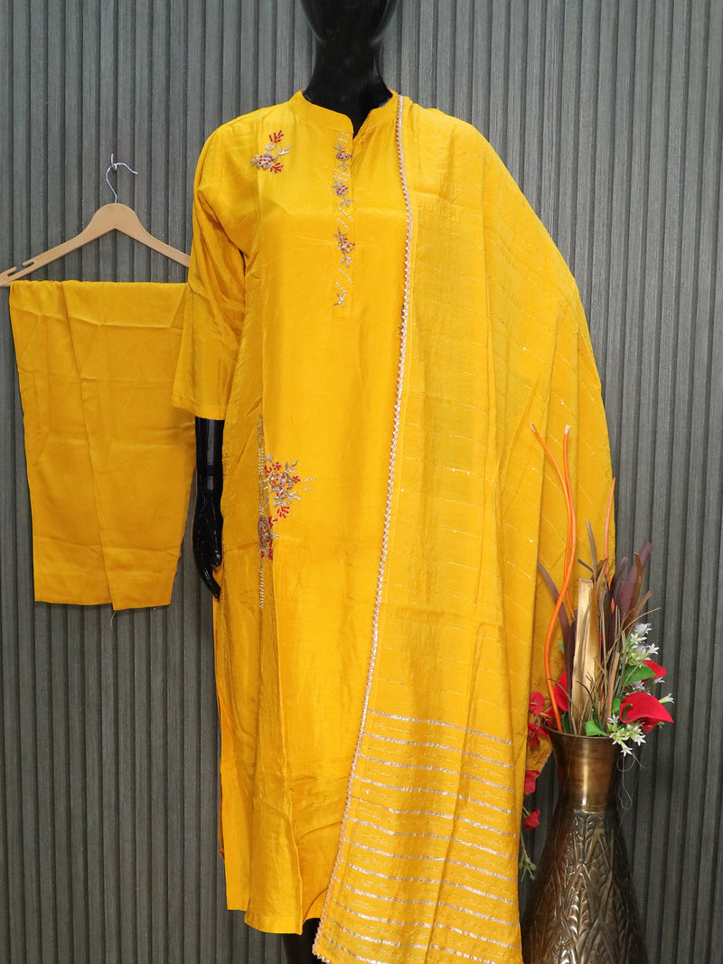 Muslin readymade party wear salwar suits yellow with allover embroidery work and straight cut pant & sequin work dupatta