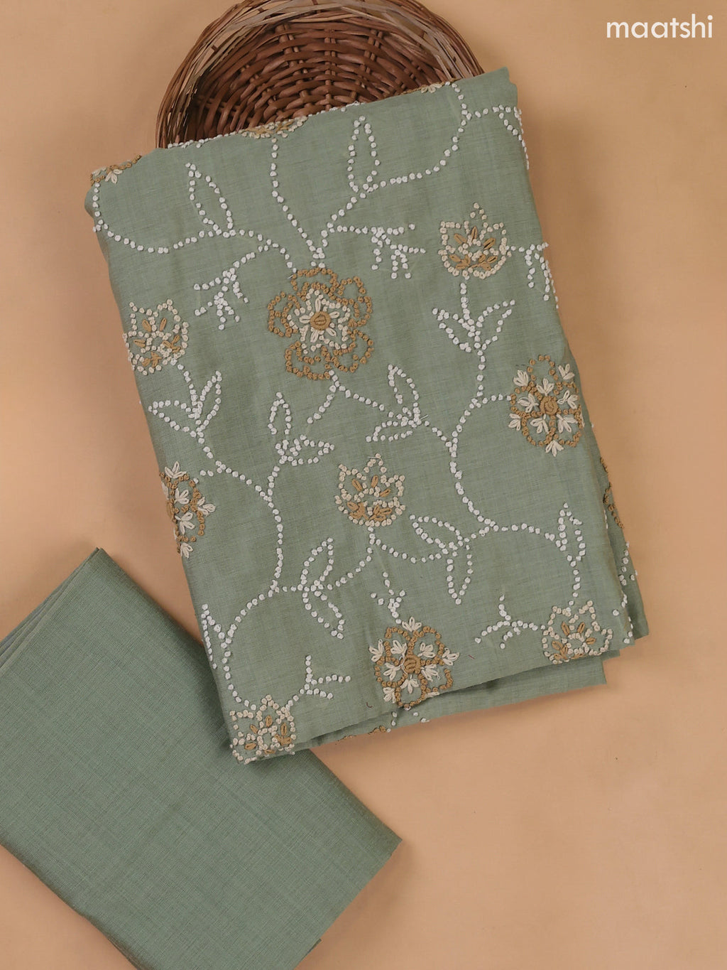 Pastel Green Munga Cotton Dress Material With All Over French Knot Work Pattern