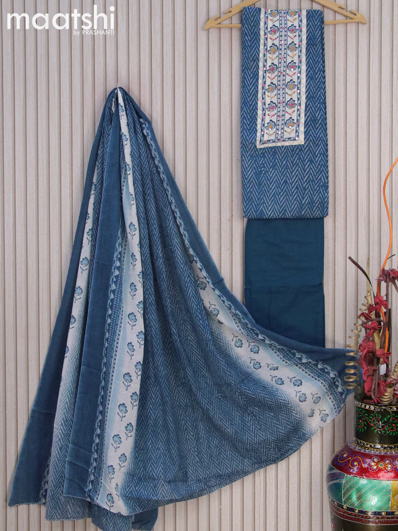 Cotton dress material blue shade with allover prints & embroidery work neck pattern and bottom & dupatta