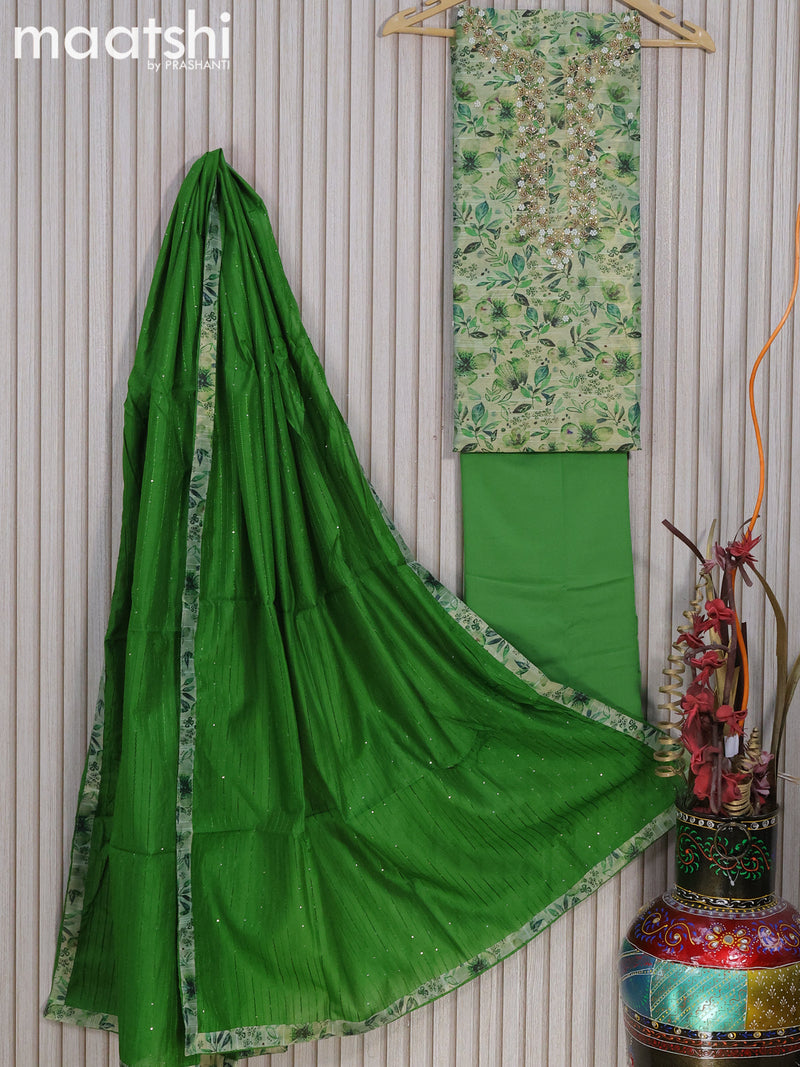 Tissue dress material green shade with allover floral prints & beaded work neck pattern and bottom & sequin work dupatta