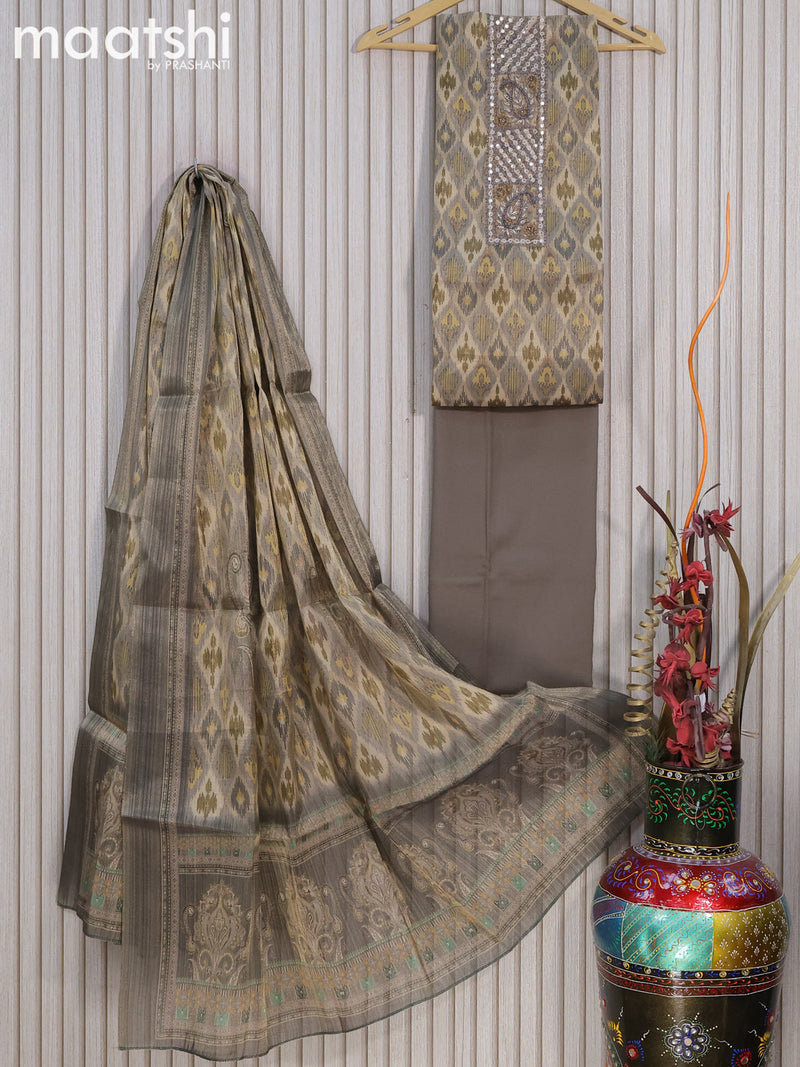 Tissue dress material grey shade with allover ikat prints & beaded mirror work neck pattern and bottom & dupatta