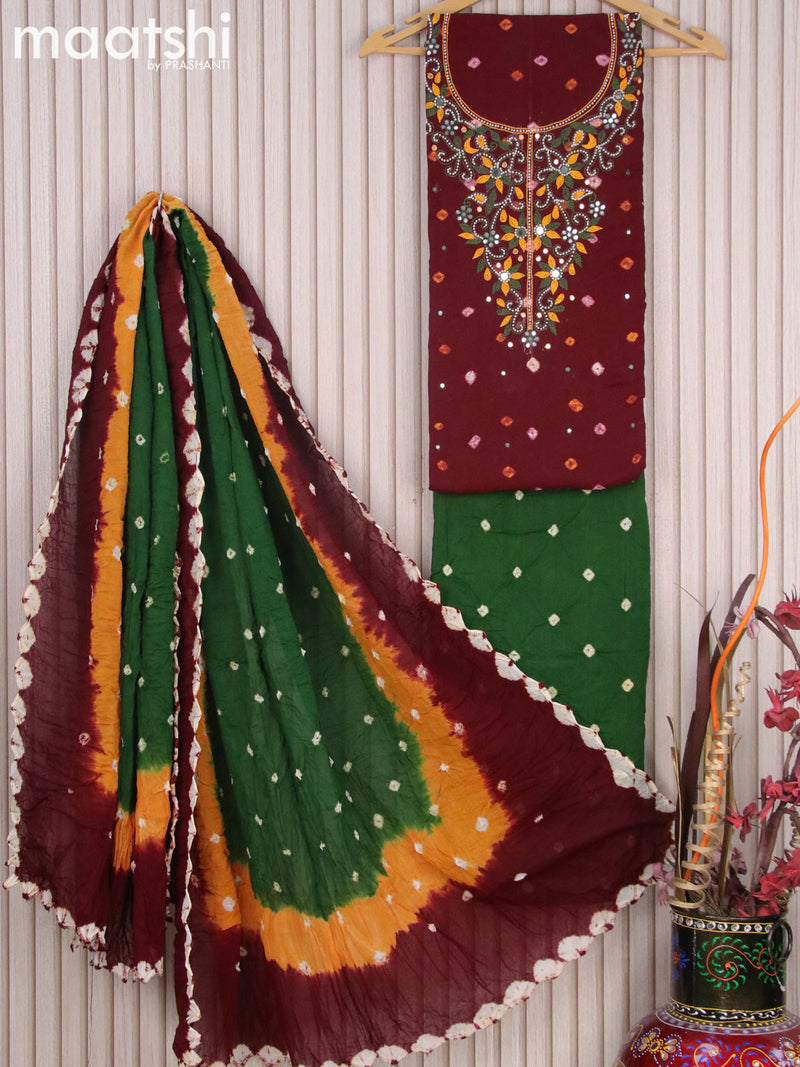 Cotton dress material deep maroon and green with batik butta prints & embroidery beaded work neck pattern and bottom & dupatta