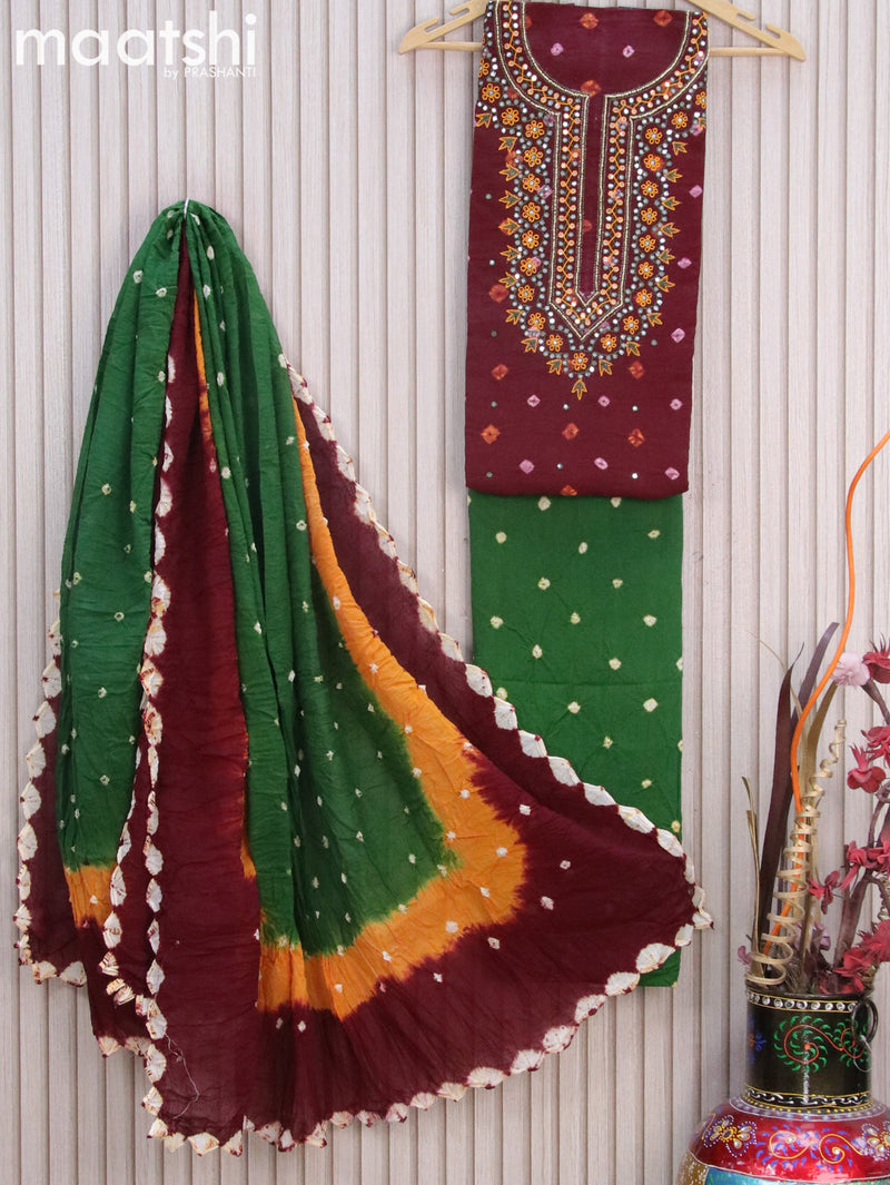 Cotton dress material deep maroon and green with batik prints & embroidery mirror work neck pattern and bottom & batik prints dupatta