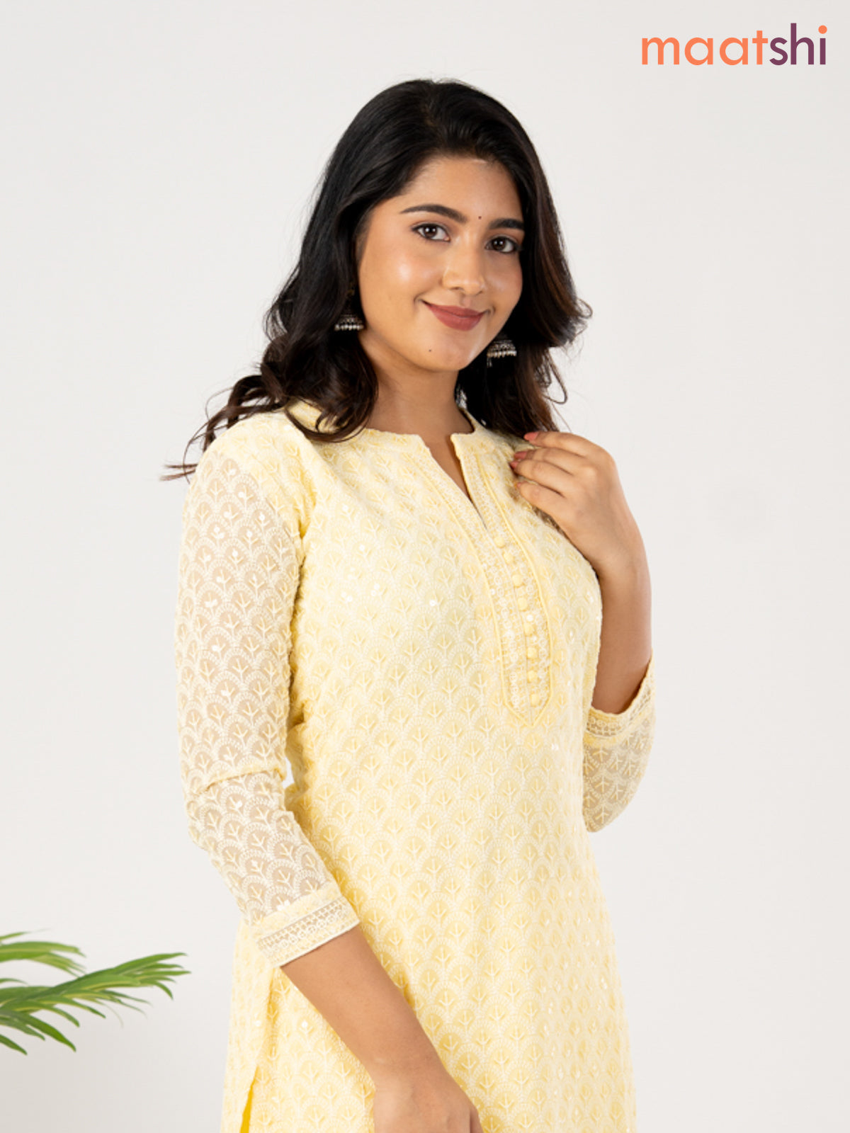 Semi georgette kurti pale yellow with allover chikankari work & simple neck pattern without pant