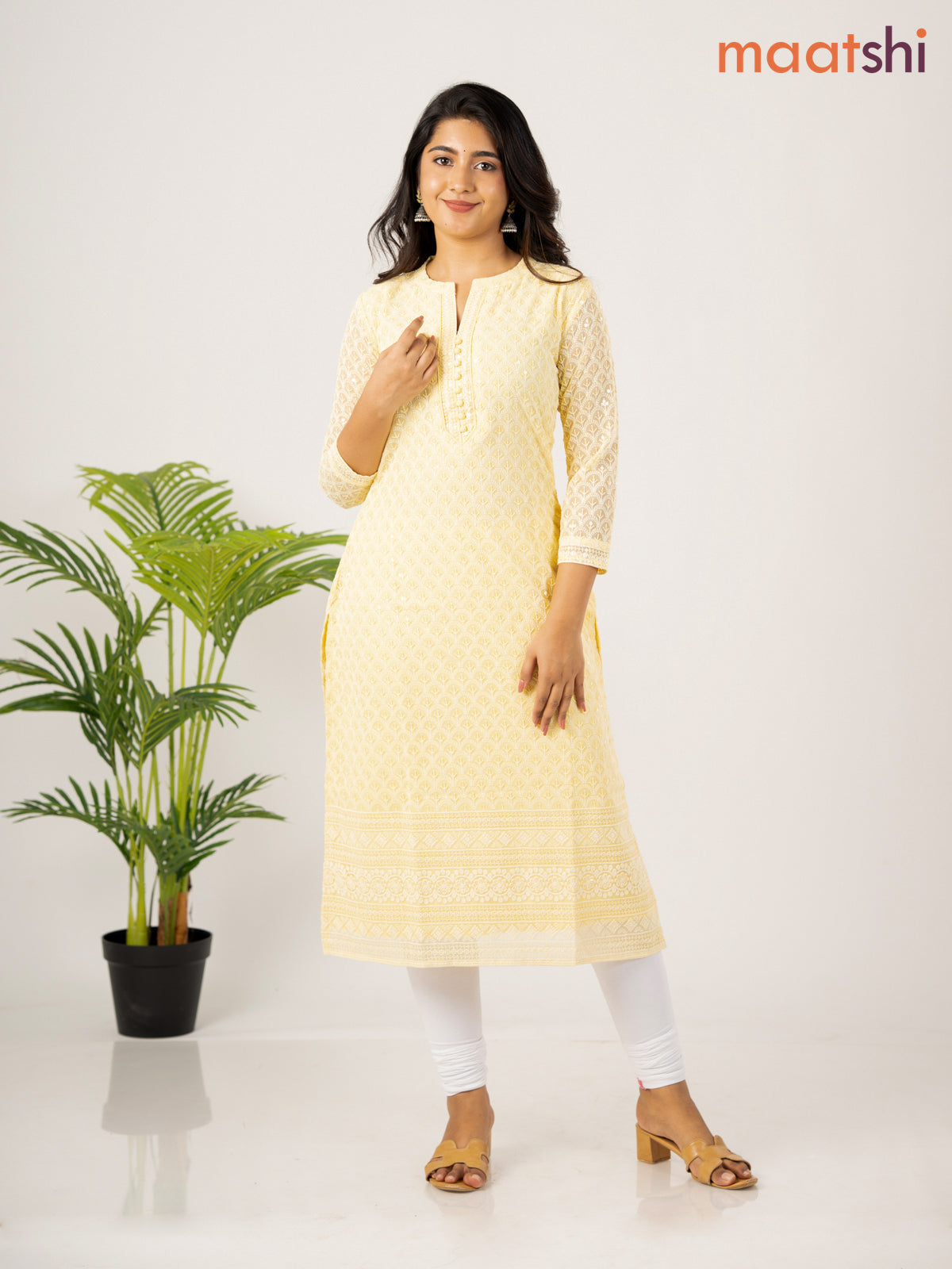 Semi georgette kurti pale yellow with allover chikankari work & simple neck pattern without pant