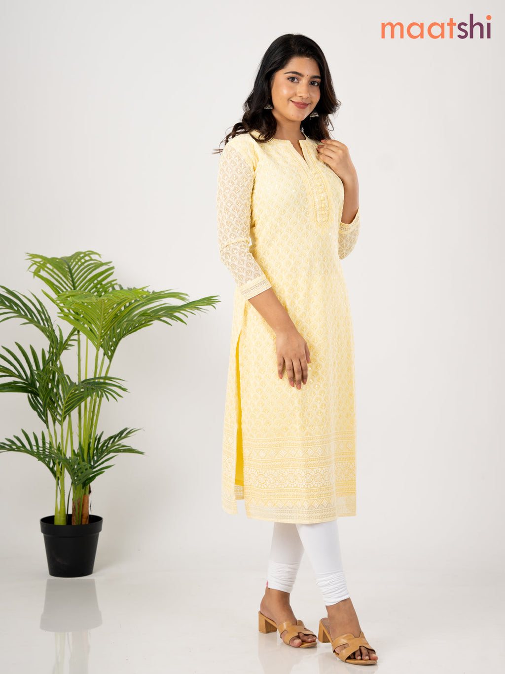 Semi georgette kurti pale yellow with allover chikankari work & simple neck pattern without pant