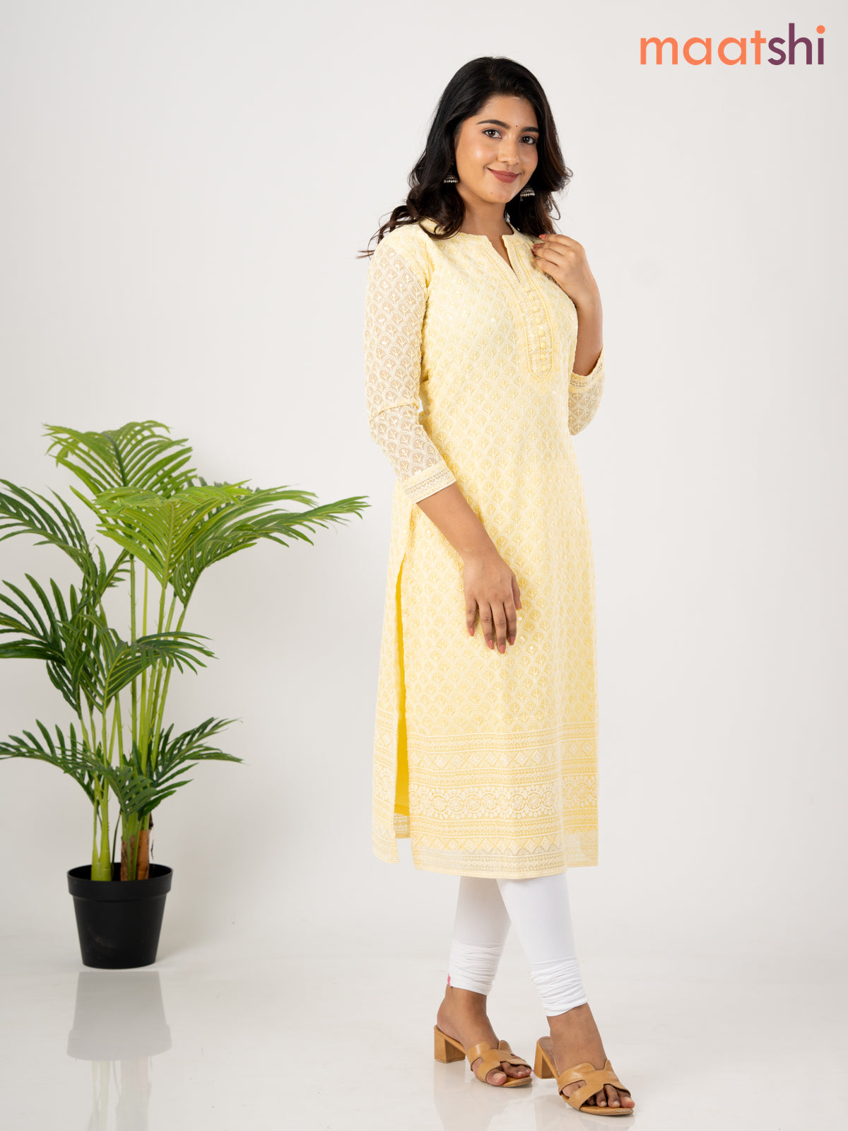 Semi georgette kurti pale yellow with allover chikankari work & simple neck pattern without pant
