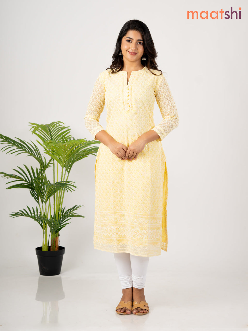 Semi georgette kurti pale yellow with allover chikankari work & simple neck pattern without pant