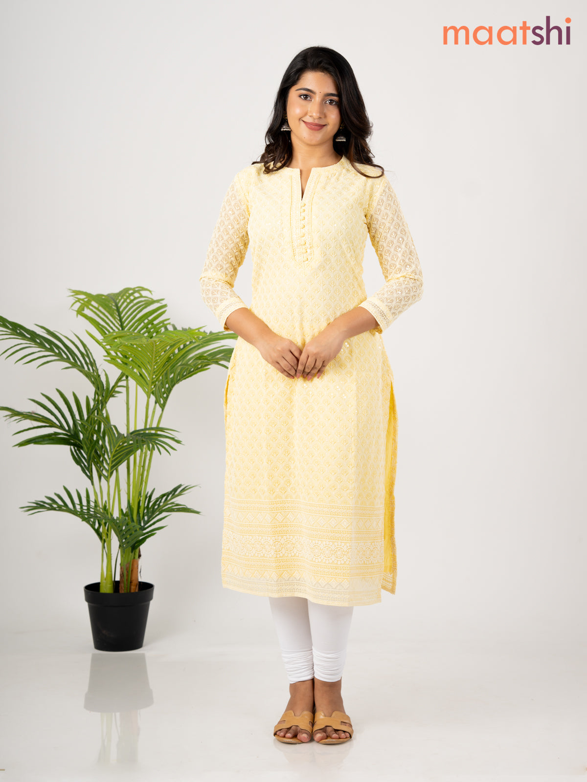 Semi georgette kurti pale yellow with allover chikankari work & simple neck pattern without pant