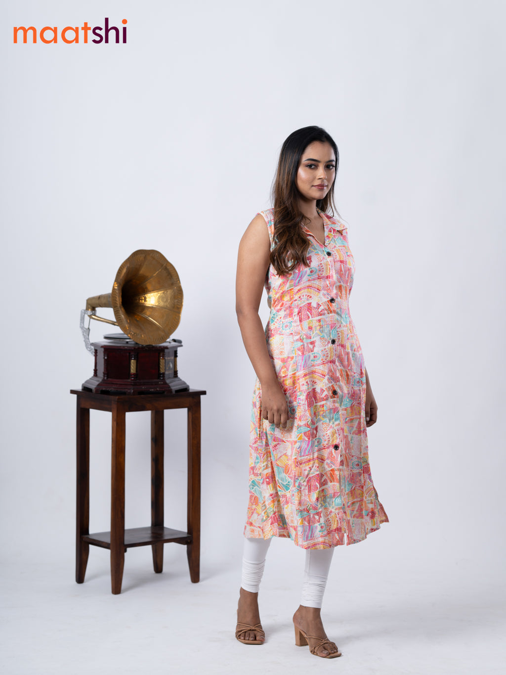 Rayon A-line kurti cream and teal blue with allover prints & thread weaves collar neck without pant & sleeve attached