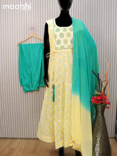 Raw silk readymade anarkali salwar suit pale yellow and teal green with butta prints & embroidery sequin work neck pattern and straight cut pant & chiffon dupatta sleeve attached