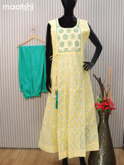 Raw silk readymade anarkali salwar suit pale yellow and teal green with butta prints & embroidery sequin work neck pattern and straight cut pant & chiffon dupatta sleeve attached