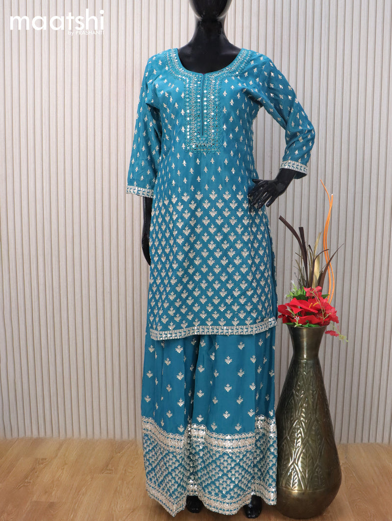 Silk georgette readymade salwar suit cs blue with allover embroidery & mirror work neck pattern and sharara pant & netted dupatta sleeve attached