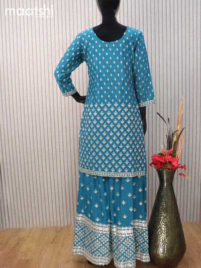 Silk georgette readymade salwar suit cs blue with allover embroidery & mirror work neck pattern and sharara pant & netted dupatta sleeve attached