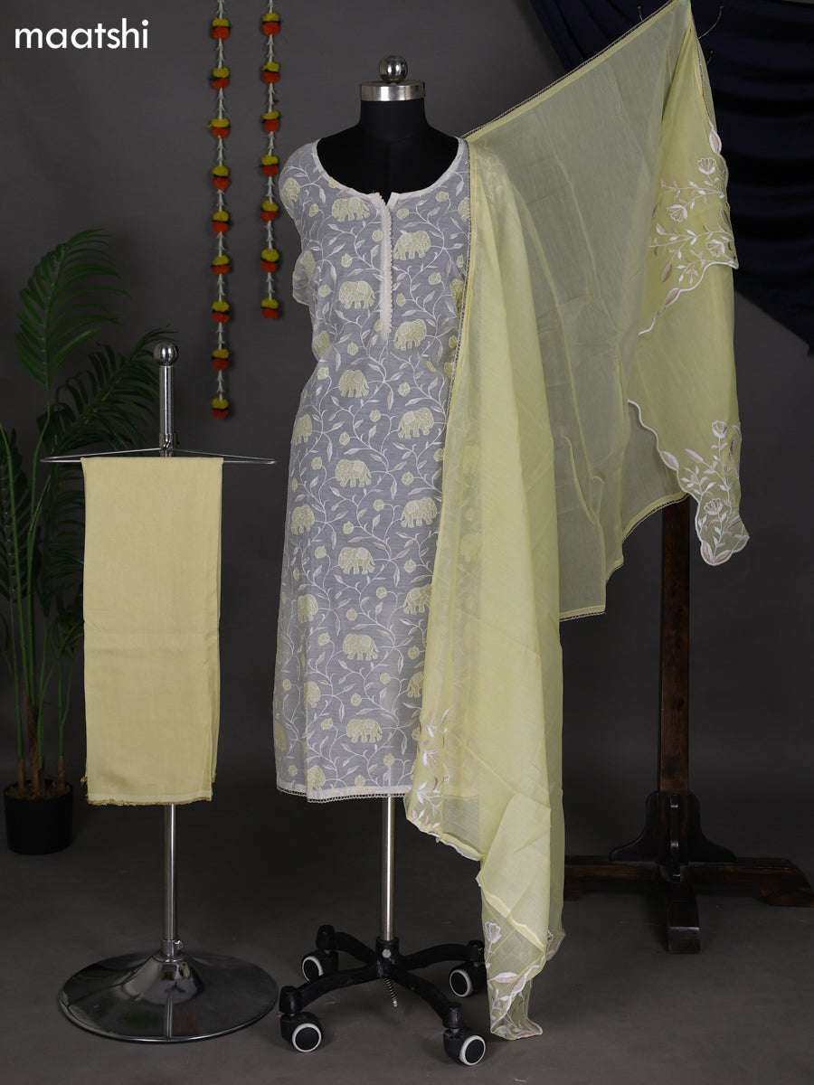 Off White and Pale Yellow Semi Stitch Mul Chanderi Dress Material With Embroidery Work Pattern