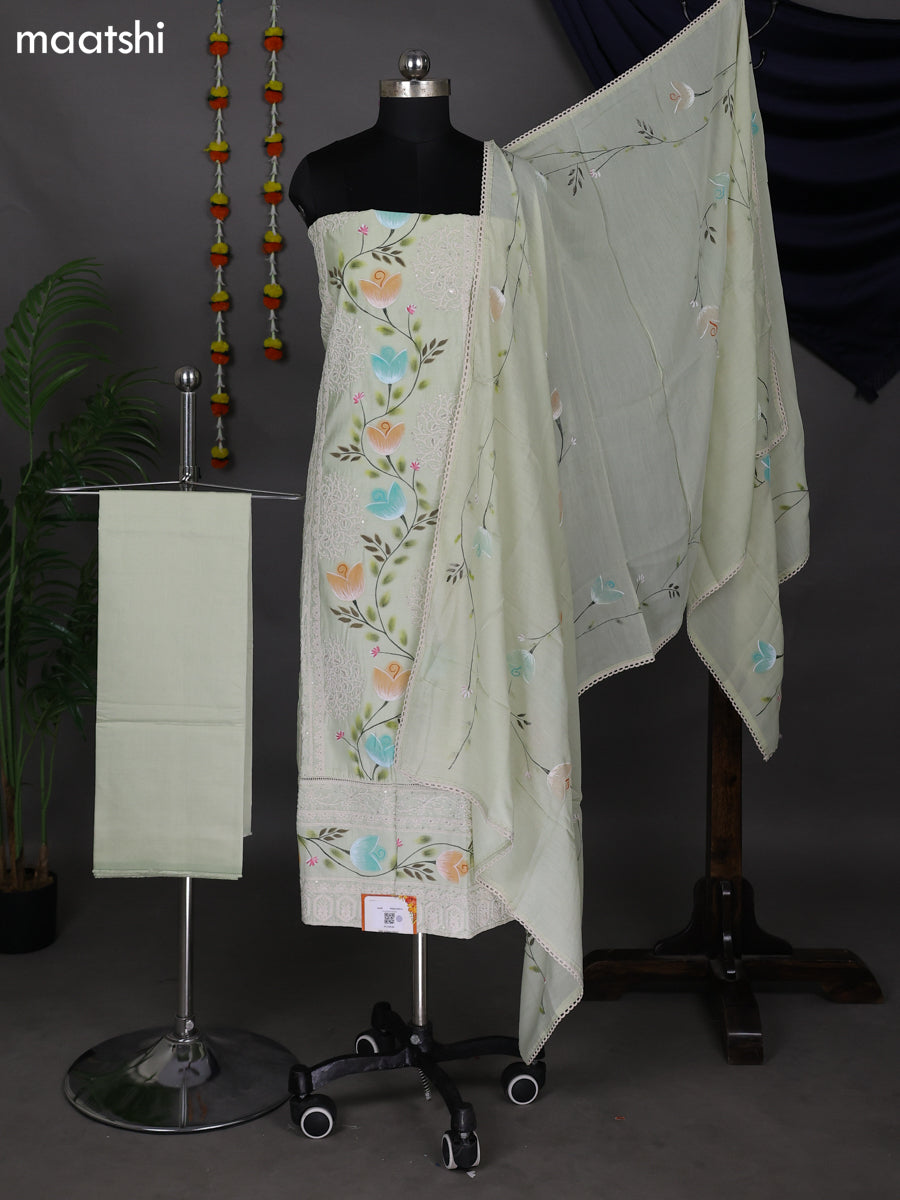 Mild Pista Green Raw Silk Dress Material With Embroidery Work Neck Pattern