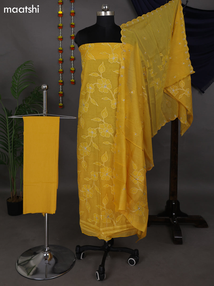 Yellow Mul Chanderi Dress Material With Floral Patch Pattern
