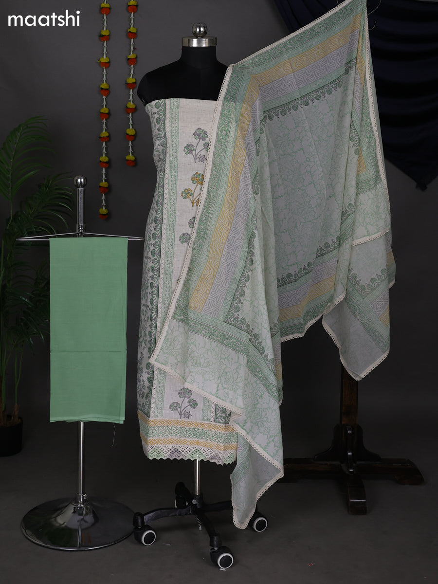 Off White and Pastel Green Cotton Dress Material With Allover Prints