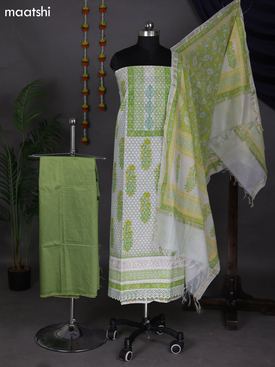 Off White and Pastel Green Cotton Dress Material With Allover Prints & Lace Work Botter