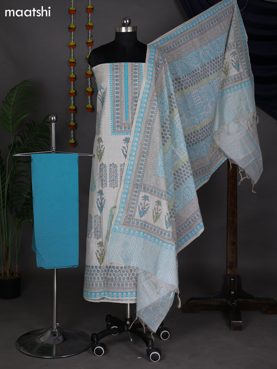 Off White and Teal Blue Chanderi Dress Material With Allover Prints