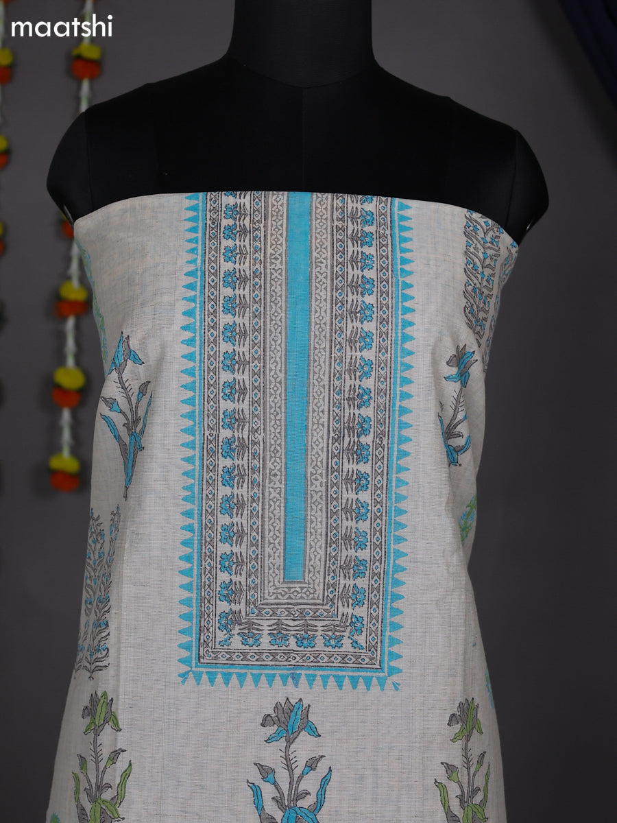 Off White and Teal Blue Chanderi Dress Material With Allover Prints