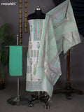 Off White and Teal Green Chanderi Dress Material With Allover Prints