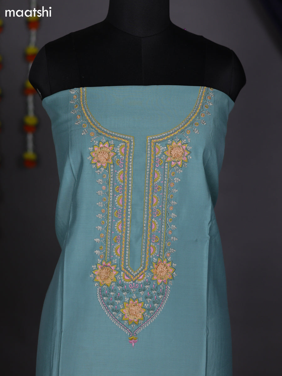 Pastel Green and Mustard Shade Raw Silk Dress Material With Embroidery Work Neck Pattern