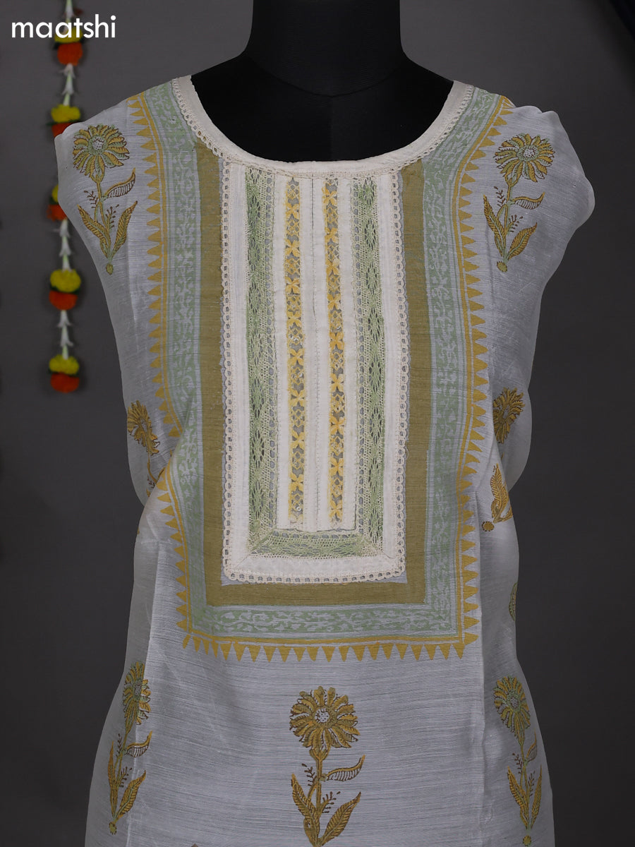 Off White and Mustard Shade Chanderi Dress Material With Allover Prints