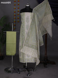 Off White and Pastel Green Chanderi Dress Material With Allover Prints